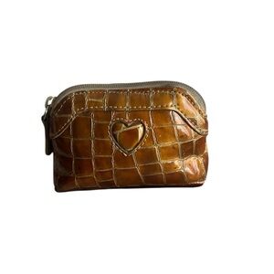 Brighton Heart Cutout Coin Purse in a metallic gold or bronze finish.
